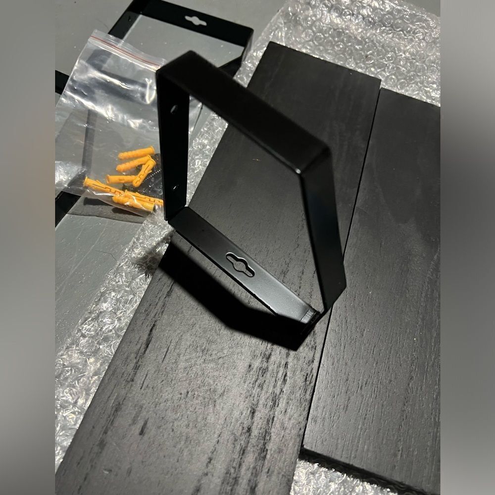 3 black wood shelves/ wall decor